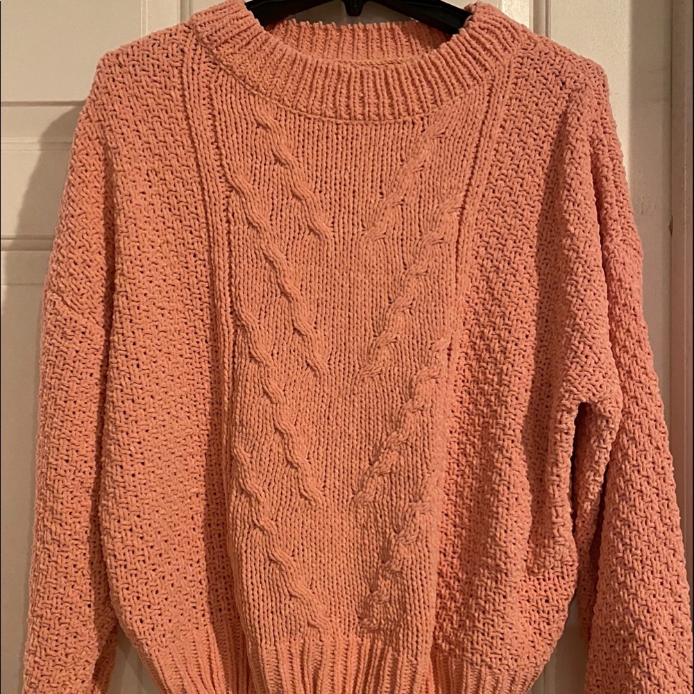 Warm peachy-pink sweater